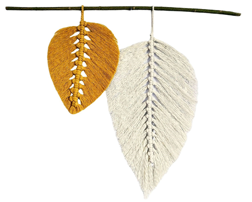 Macrame art of two leaves hanging from a branch