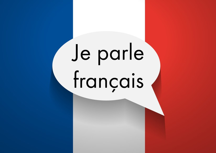 French flag with the words 'Je parle francais' in a speech bubble overlaid