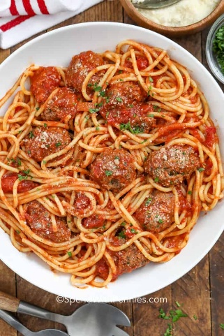 Spaghetti with meatball plate on a table