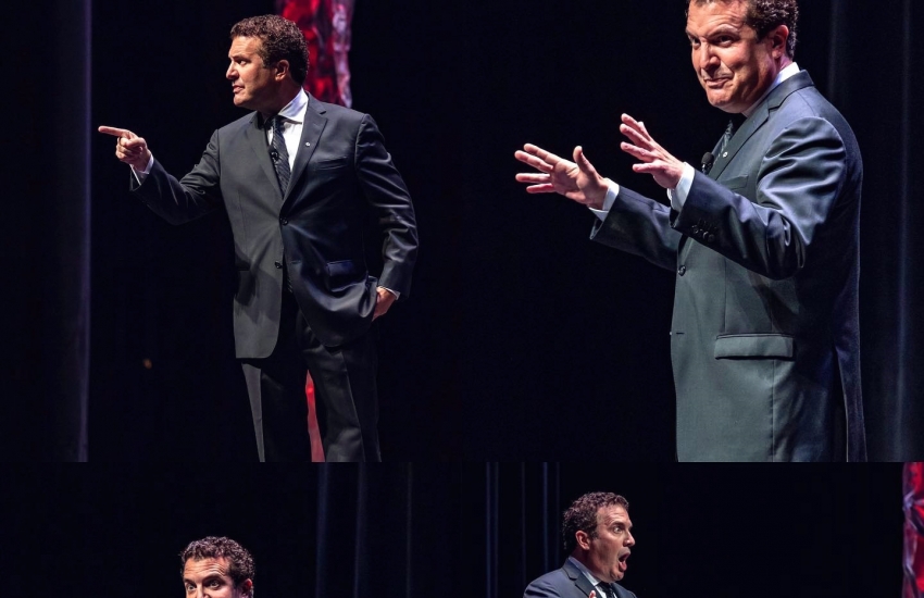 Rick Mercer performing on stage at the Chrysler Theatre.
