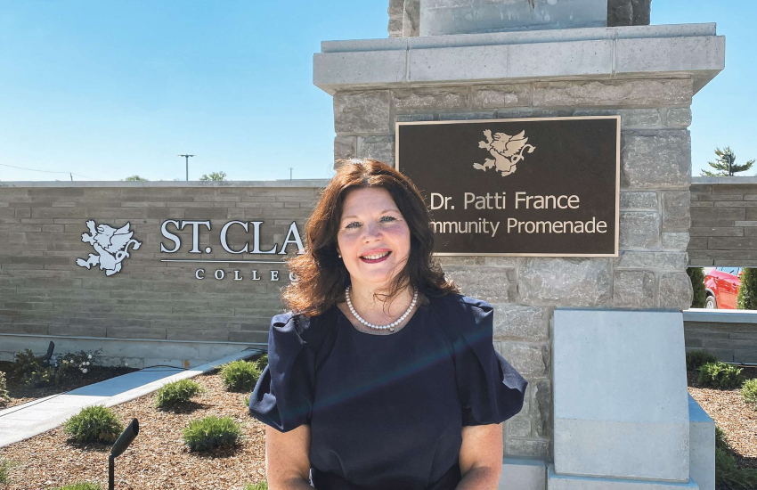 Patti France standing in front of the new promenade.