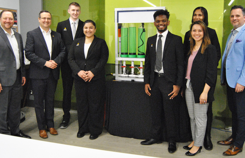 People in front of display