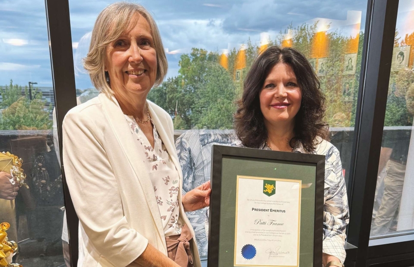 Patti receiving her scroll