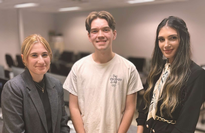 Jordan Robinet, Emma Papa and Eva Qoja posing for a photo