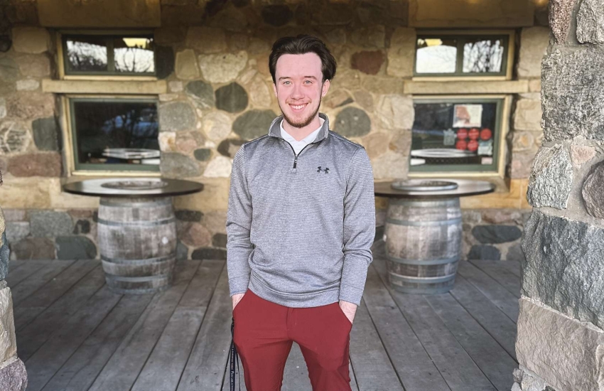 Dylan Taylor poses for a photo at Mettawas Station Mediterranean Restaurant