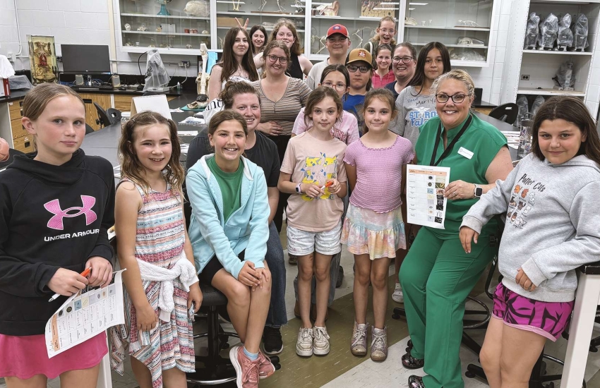 Students in St. Clair College's Veterinary Technician program work with members of the Essex County 4-H Veterinary Club