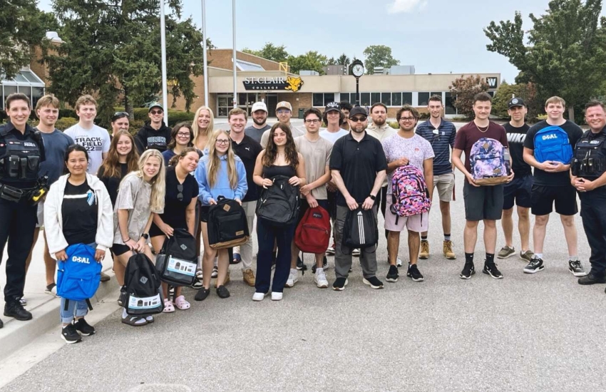 St. Clair College Police Foundations (Fast Track) students are joined by members of the Waterloo Regional Police Service