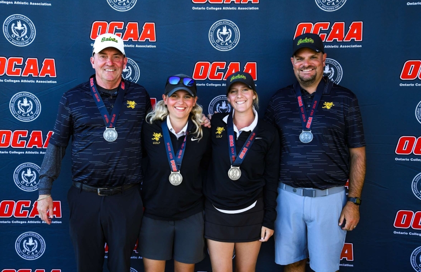 St. Clair's women's golf team, featuring head coach Kevin Corriveau, Justine Gorham, Alyssa Cowling and Assistant Coach Chris Meloche at the OCAA Championship on Oct. 1, 2025. 
