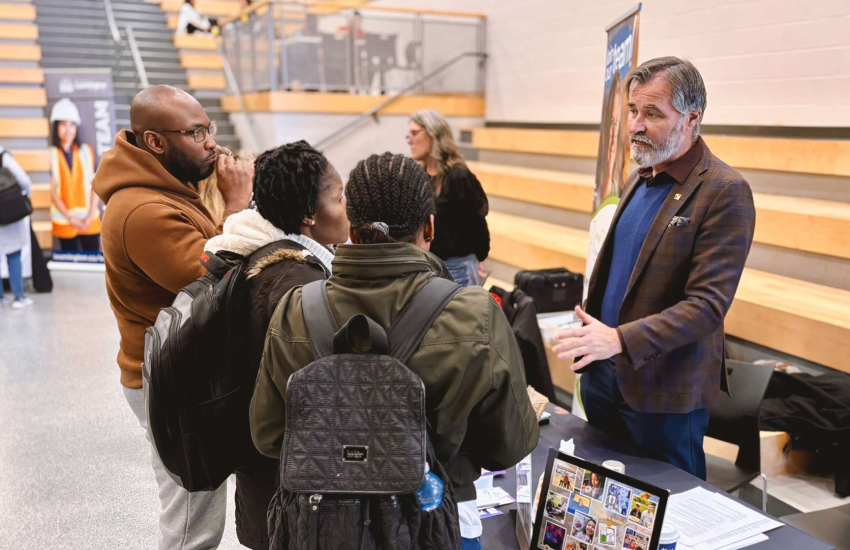 Employers speaking to students.