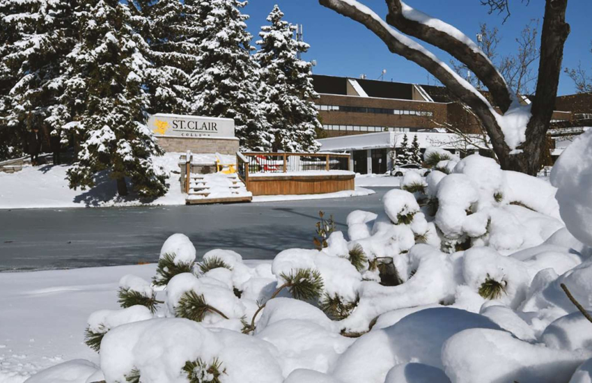 College pond and area covered in ice and snow