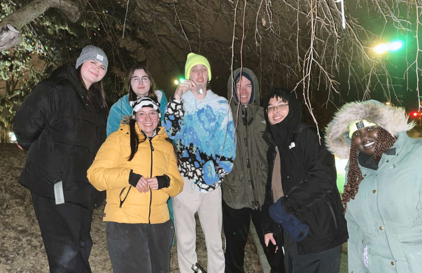 St. Clair College students bundle and huddle up to stay warm during the Rough Night Out