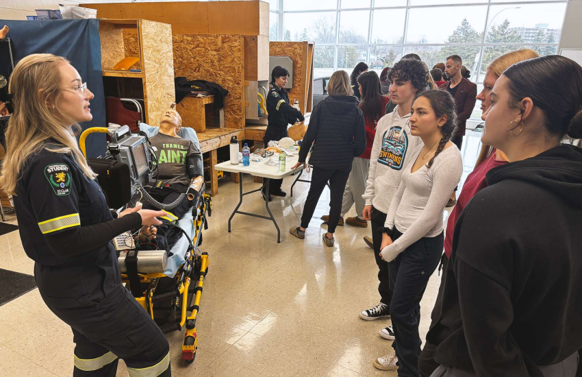 Chatham-Kent High school students with a Paramedic student at St. Clair College's Chatham Campus for Healthcare Horizons