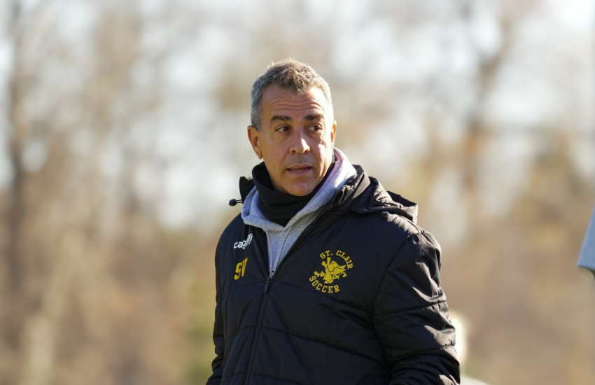 Steve Vagnini on the sidelines of the pitch during a game in the 2026 Women's Soccer season
