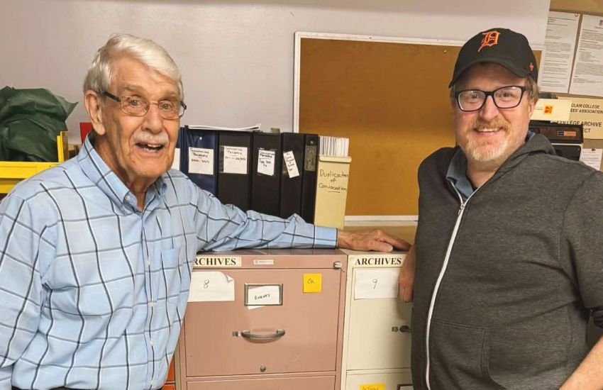 Bill Totten and filmmaker Mike Evans meet at St. Clair College's archive room