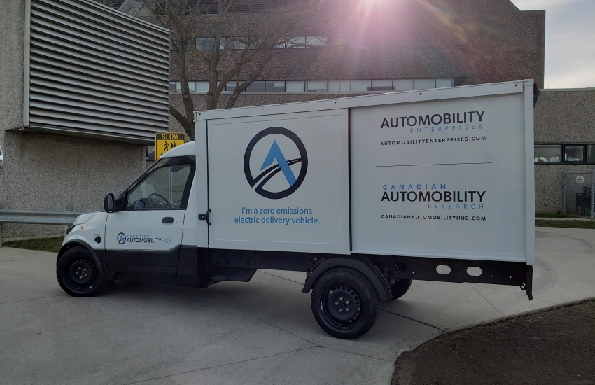 Truck in front of building.