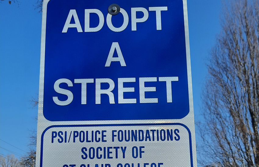 Adopt A Street sign