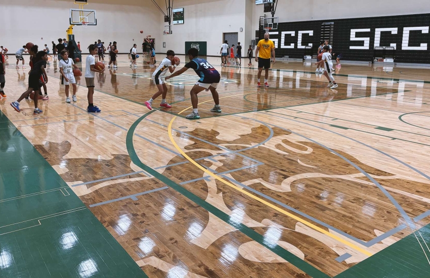 Basketball players in a gymnasium