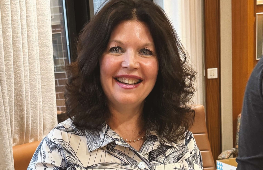 Patti receiving a gift