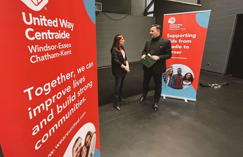 Leslie Frattaroli of the United Way speaks with St. Clair College President Michael Silvaggi