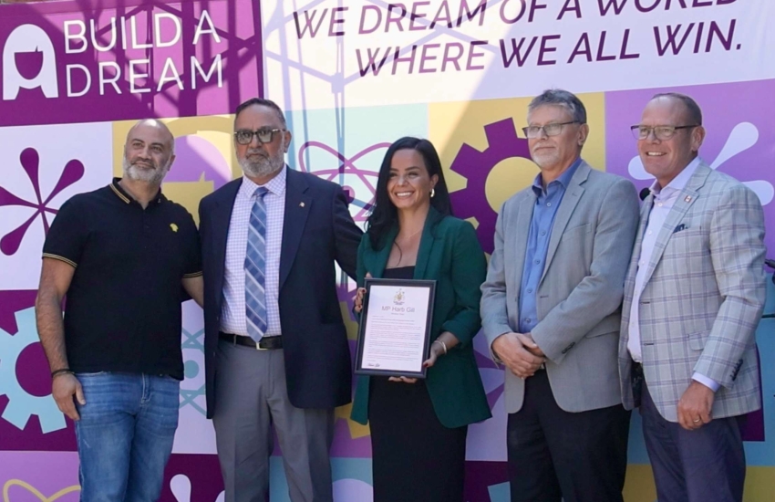 Stakeholders, partners and politicians pose for a picture at the new Build A Dream trades development incubator at Zion Robotics on Sept. 11, 2025. 