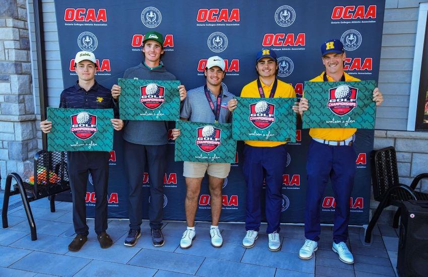 Nathan White, left, stands with the men's OCAA All-Ontario team at the OCAA Golf Championship in Pickering, Ont. Oct. 1, 2025. 