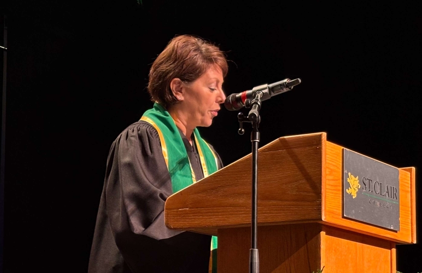 Paula Reaume-Zimmer speaks to a crowd of graduates at Chatham's Fall 2025 Convocation ceremony at the Capitol Theatre in Chatham on Oct. 2, 2025. 