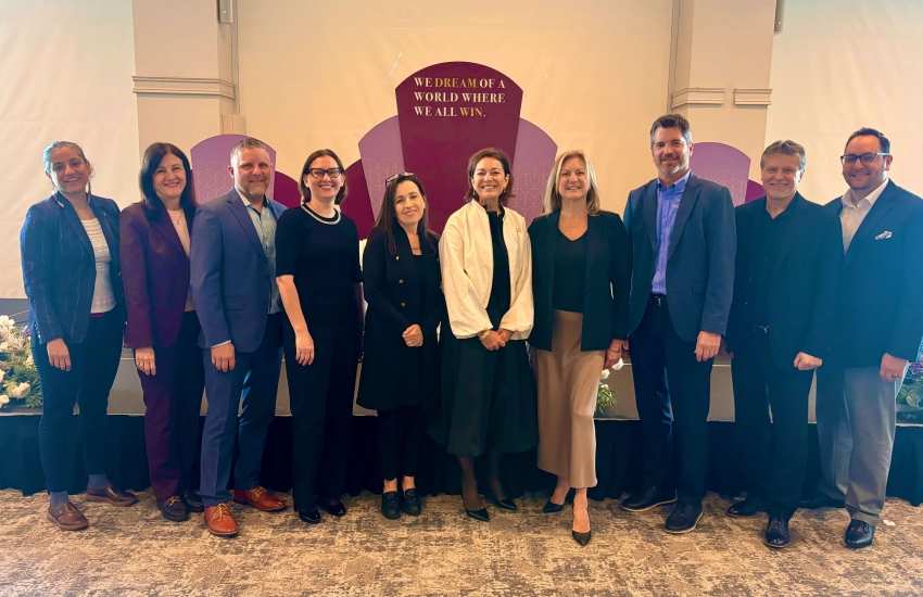 Representatives from St. Clair College pose for a picture at the International Day of the Girl at the St. Clair College Centre for the Arts on Oct. 9, 2025.