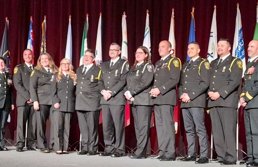 St. Clair College Paramedic professor John Lassaline stands with EMS officials to accept the Governor General's Emergency Medical Service Exemplary Service Medal on Sept. 25, 2025.