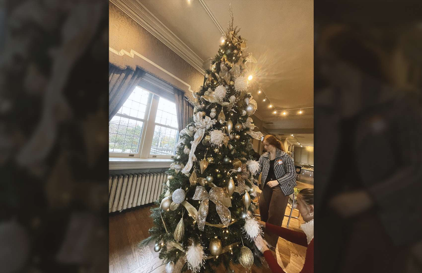 St. Clair College Interior Design students decorate a Christmas tree for the holidays at Willistead Manor
