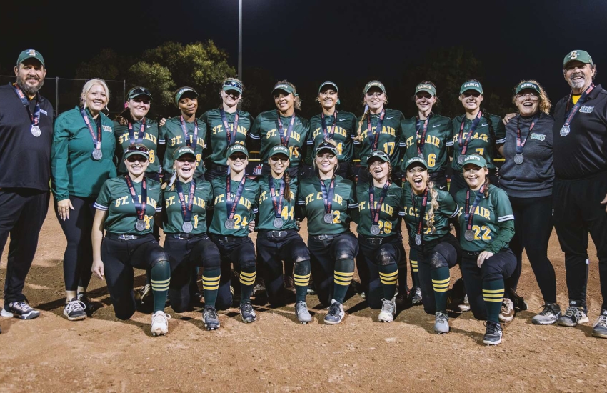 Saints Women's Softball holds their silver medals