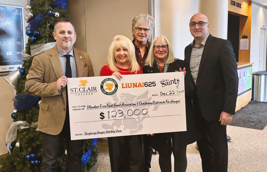 St. Clair College President Michael Silvaggi, June Muir, Jeff Burrows, Brenda LeClair and Joe D'Angela showing off the record-setting cheque