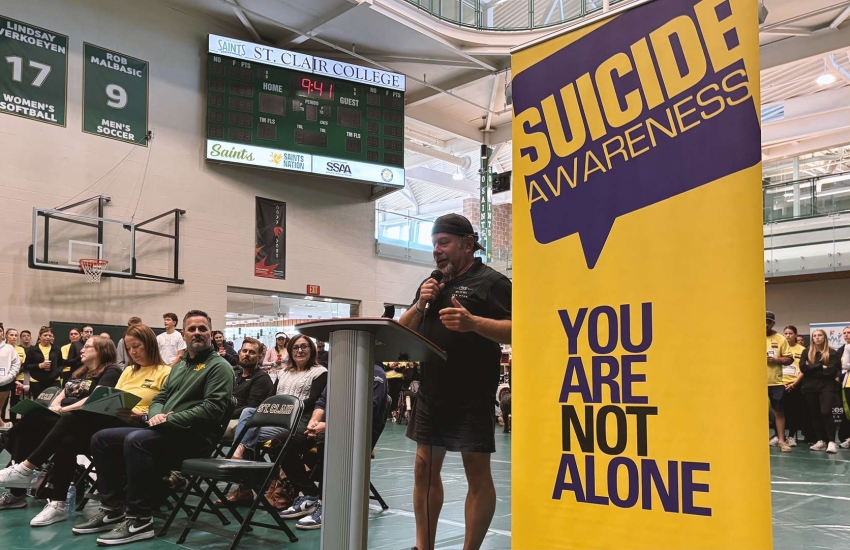 Chad Kennedy speaks to the crowd at the St. Clair College SportsPlex