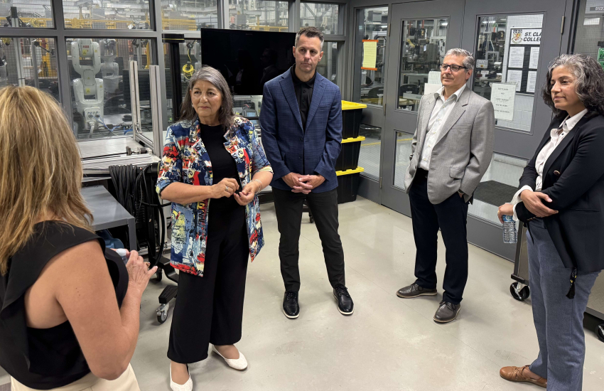 Windsor-Tecumseh-Lakeshore MP Kathy Borrelli listens to a presentation by members of the St. Clair College Research and Innovation department on July 9, 2026.
