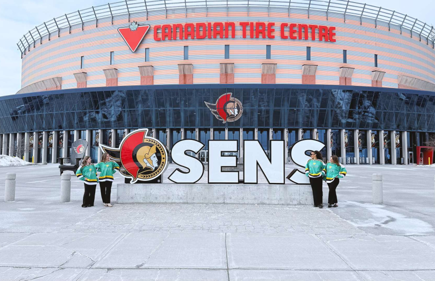 Sausha Goodhand, Elle Hebert, Airika Natyshak and Aryanna Pierson outside the Canadian Tire Centre in Ottawa, Ont. for the NHL Hockey Innovation Competition