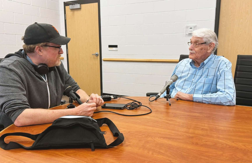 Mike Evans interviews Bill Totten for his documentary Ann Arbor Blues Festival in Exile in the St. Clair College archive room