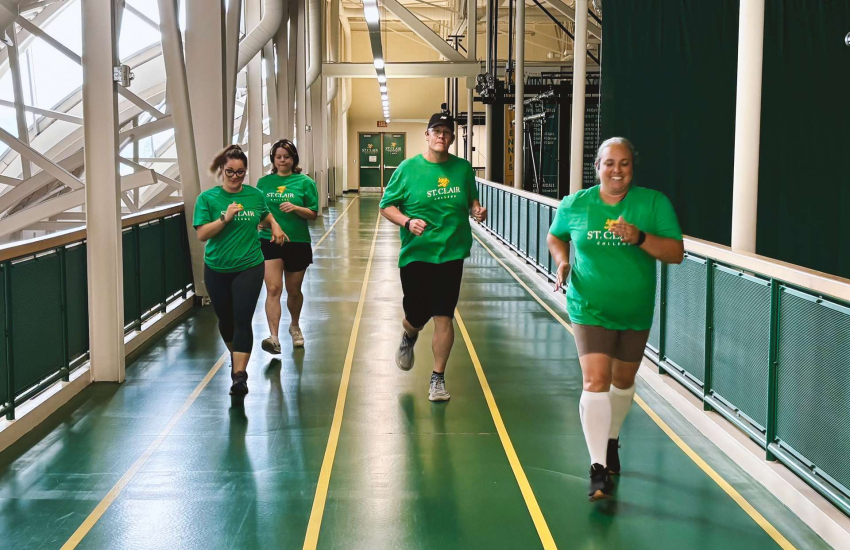 Members of the Saints on the Run club take part in a training session