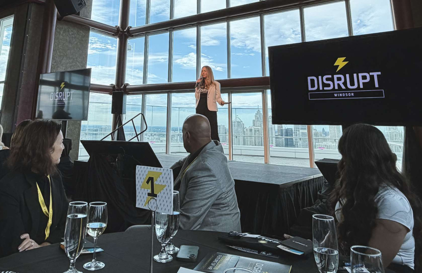 Meighen Nehme speaking on stage