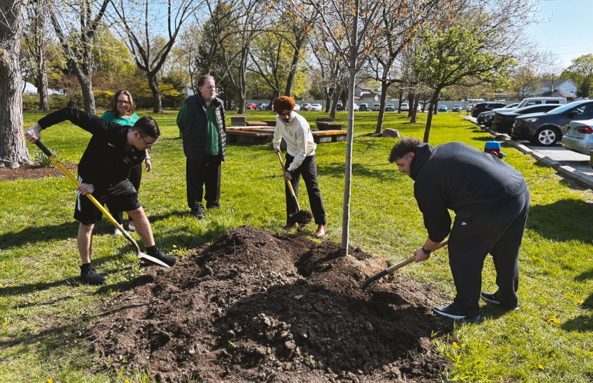 SRC, SSAA, YQG Green and St. Clair College representatives plant a tree on Earth Day at Main Windsor Campus