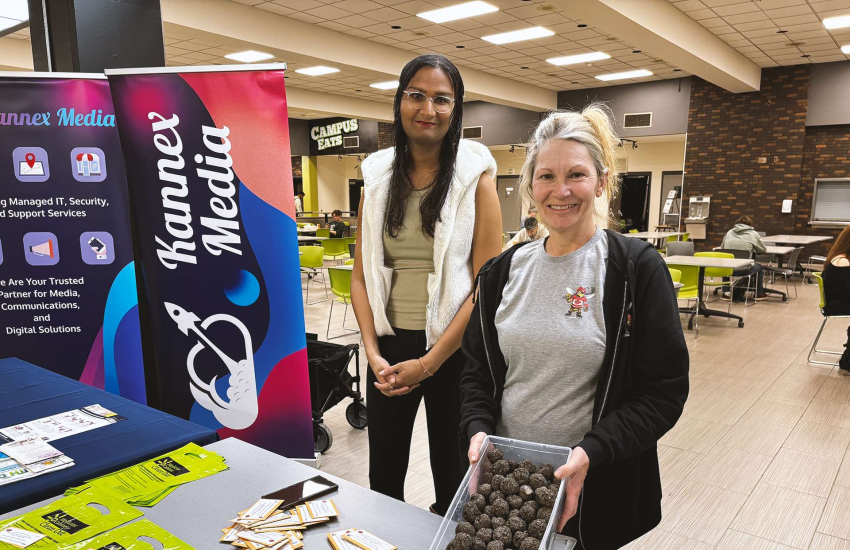 Representatives from Kannex Media and Unifor local 444 take part in an eco-friendly vendor booth during Earth Day celebrations at Main Windsor Campus
