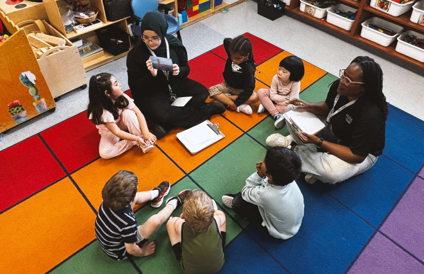 St. Clair College Early Childhood Education students interact and instruct kindergarten students at Notre Dame Catholic Elementary School