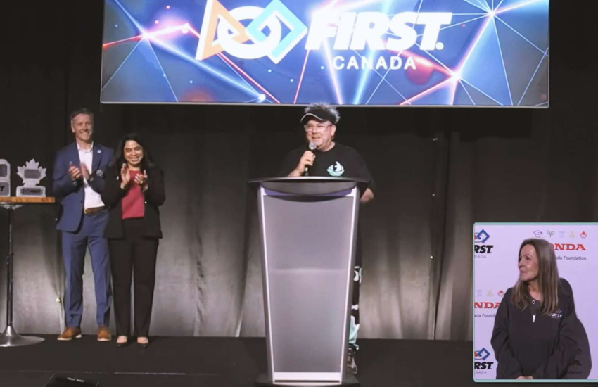 Prof. Al Douglas accepts the FIRST Robotics Canada Education Partner Excellence Award
