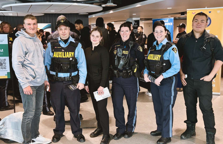 Students and professionals pose together at the First Responders Career Fair