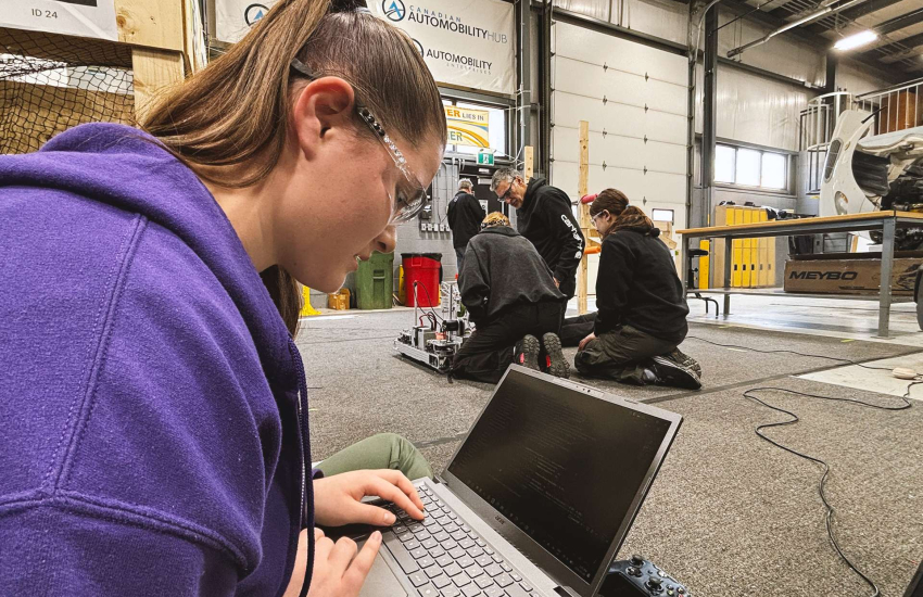 The Amazon Warriors, an all-female team based in Windsor, practicing and tweaking their robots at St. Clair College during March Break.