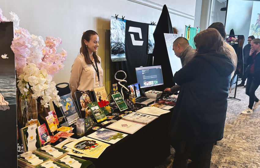 Sofiia Struts, a third-year Graphic Design student at St. Clair College showcases her work catalogue during the annual Grad Show