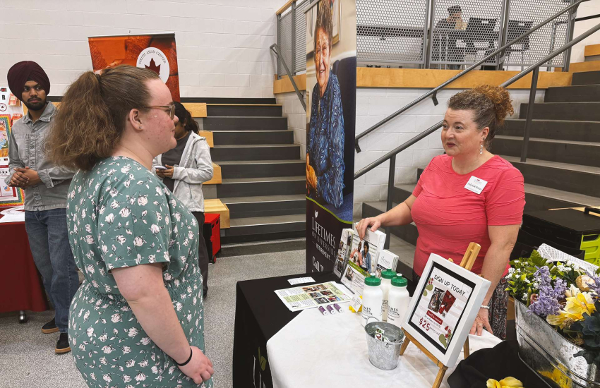 Ashley Thibert speaks to industry representatives during the Green Bench Elder Wisdom: Bridging Generations event at St. Clair College