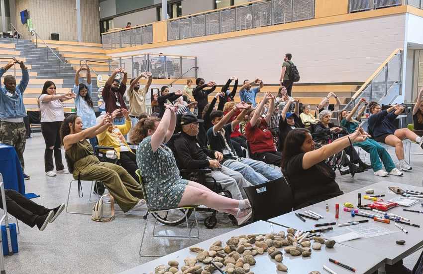 Students, staff and faculty join neighbours from The Village at St. Clair for a Zumba session during the Green Bench Elder Wisdom: Bridging Generations event at St. Clair College