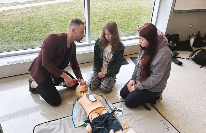 St. Clair College Paramedic Prof. Ryan Cloutier demonstrating to high school students during Healthcare Horizons at the Chatham Campus