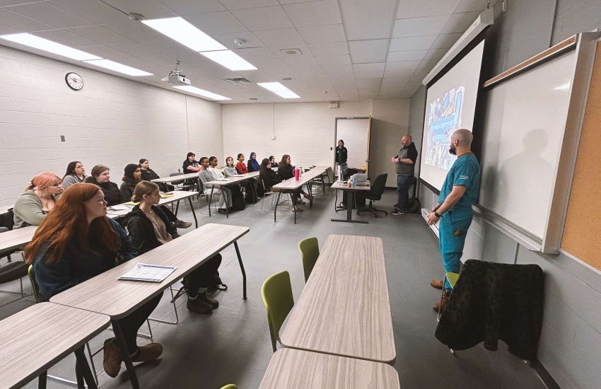 Students pay attention to a presentation about Biomedical Engineering Technology at St. Clair College's Chatham Campus during Healthcare Horizons