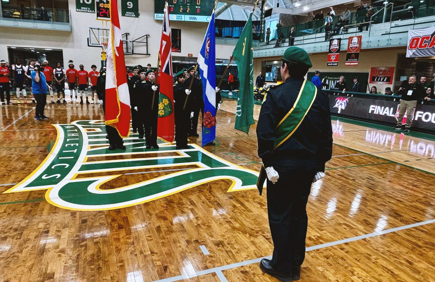 Police Foundations and Protection, Security and Investigation students at St. Clair College make their inaugural Honour Guard march at the SportsPlex