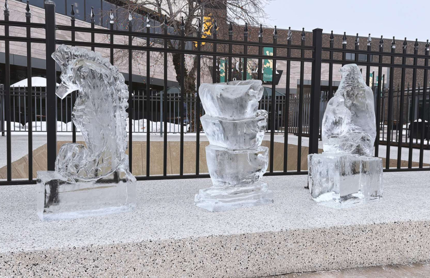 Completed ice sculptures stand guard outside the entrance to St. Clair College's Main Windsor Campus